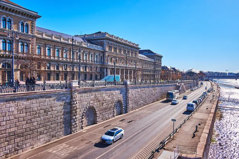 salkahazi sara embankment danube river budapest hungary stone tall wall historic building corvinus university pest 268573276